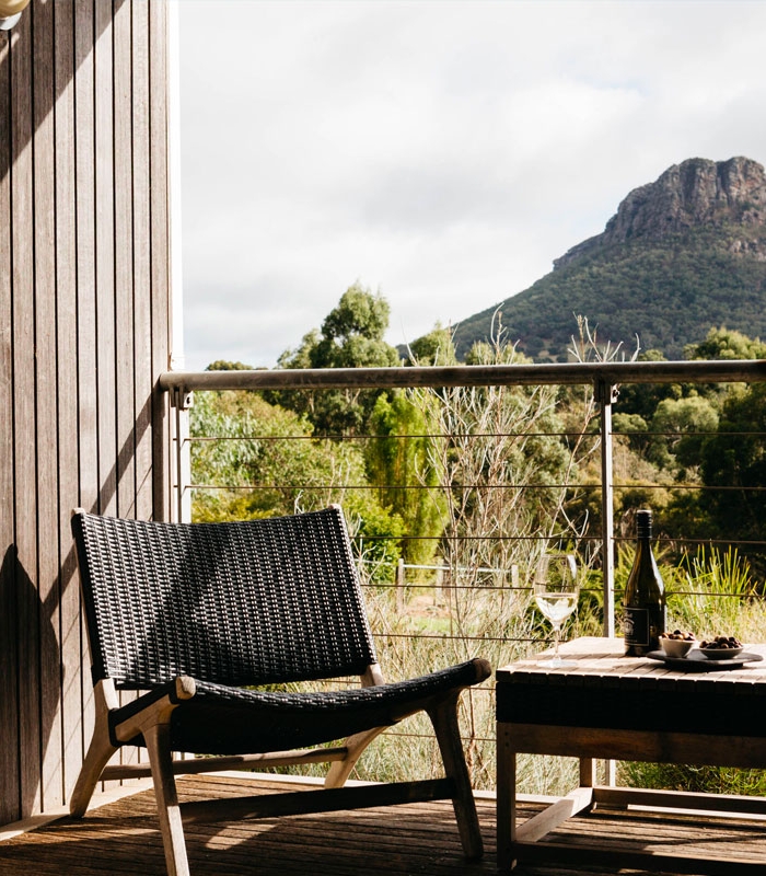 table and chairs on balcony overlooking grampians